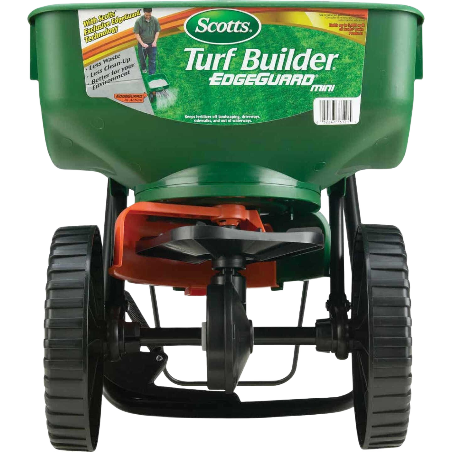 Green Scotts Turf Builder EdgeGuard mini broadcast spreader with dual black wheels for precise lawn and garden care tool use