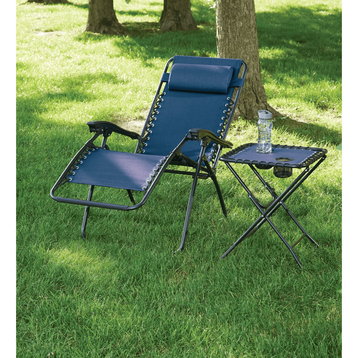 Blue convertible zero gravity relaxer lounge chair with padded headrest and black steel frame paired with matching folding side table on grassy lawn for outdoor living.