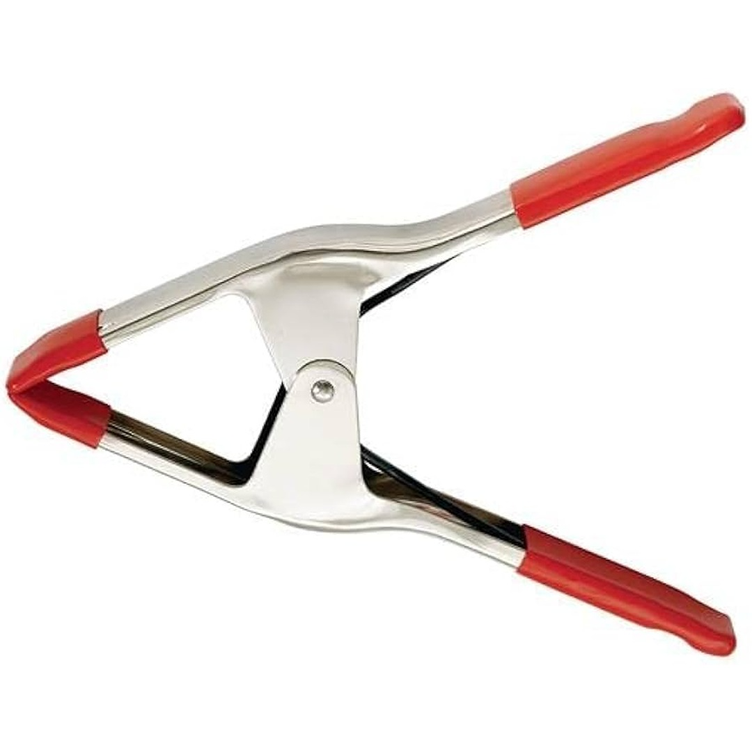 Steel spring clamp with red plastic grips and tips for woodworking and home improvement tasks