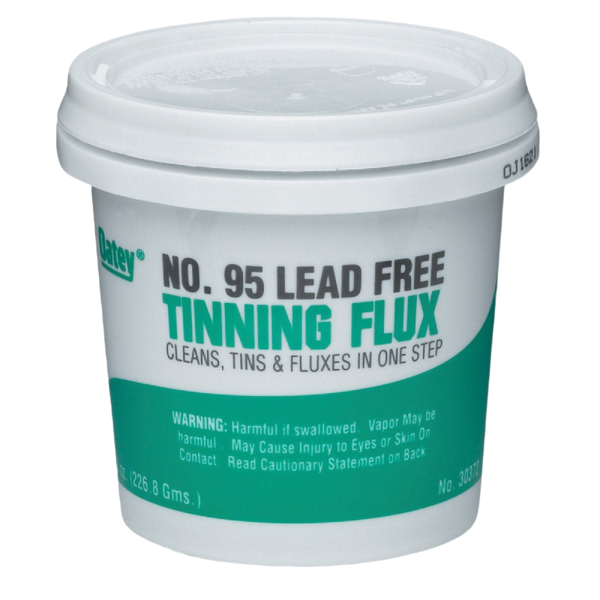 White plastic container of lead-free tinning flux with green and black printed label for tools and home improvement use
