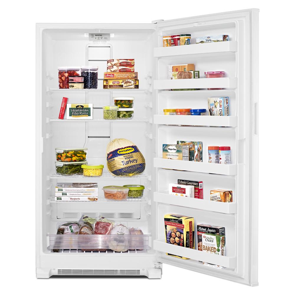 White upright freezer with organized frozen foods and LED lighting in Freezers & Ice Makers collection