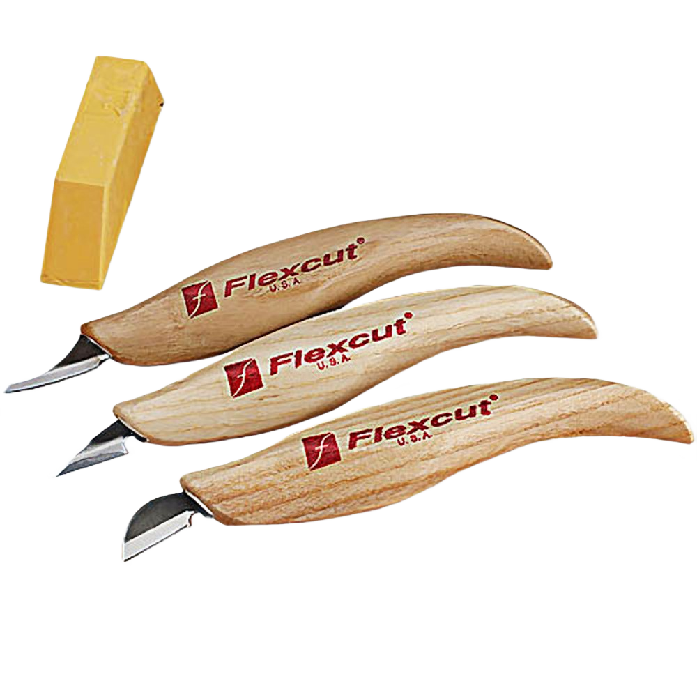 Three slim handle carving knives with wooden grips and a small yellow sharpening stone for woodworking tools and carving crafts