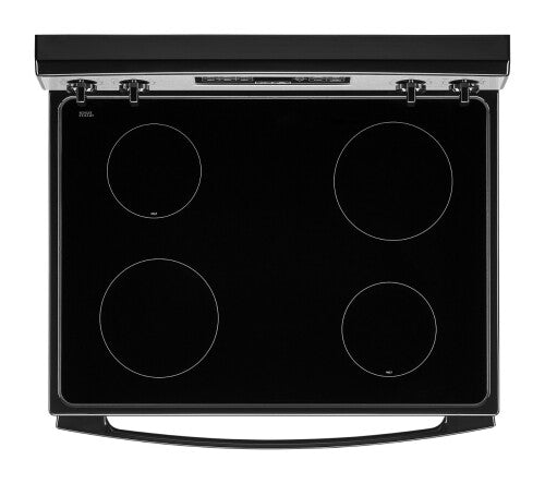 Top view of black smooth glass ceramic cooktop with four radiant heating elements from kitchen appliances collection