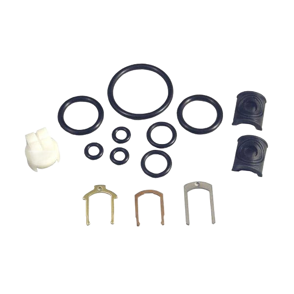 Various replacement washers, clips, and seals for faucet cartridge repair in tools and home improvement projects