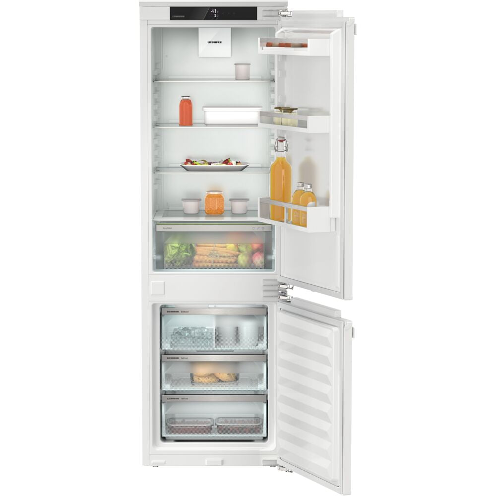 Built-in refrigerator freezer with right hinge, ice maker, adjustable glass shelves, and clear storage bins in appliances collection