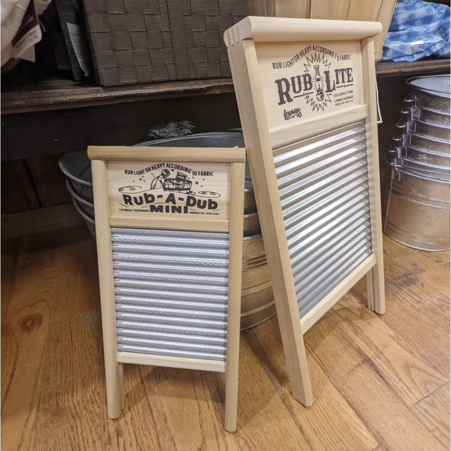 Two wooden-framed washboards with metal spiral ridges for laundry in Cleaning and Household Items collections under $50