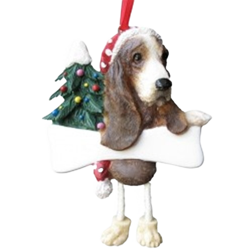 Basset hound ornament with dangling legs holding a bone and decorated Christmas tree for holiday decor under $50 collection