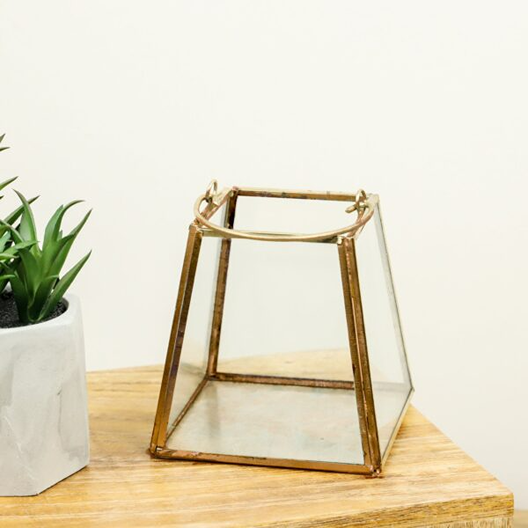 Compact brass lantern with glass panels for tealights, perfect for home accents and decor collections under $50