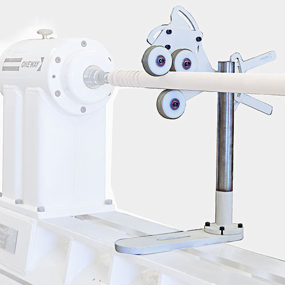 White metal spindle steady rest with adjustable rollers supporting a wooden turning blank for woodworking tools use
