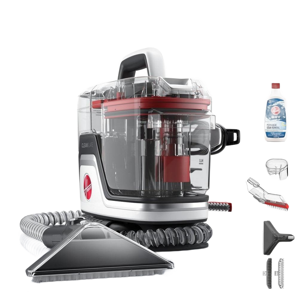 Transparent compact spot cleaner with red accents, hose attachment, cleaning solutions, and multiple nozzle accessories