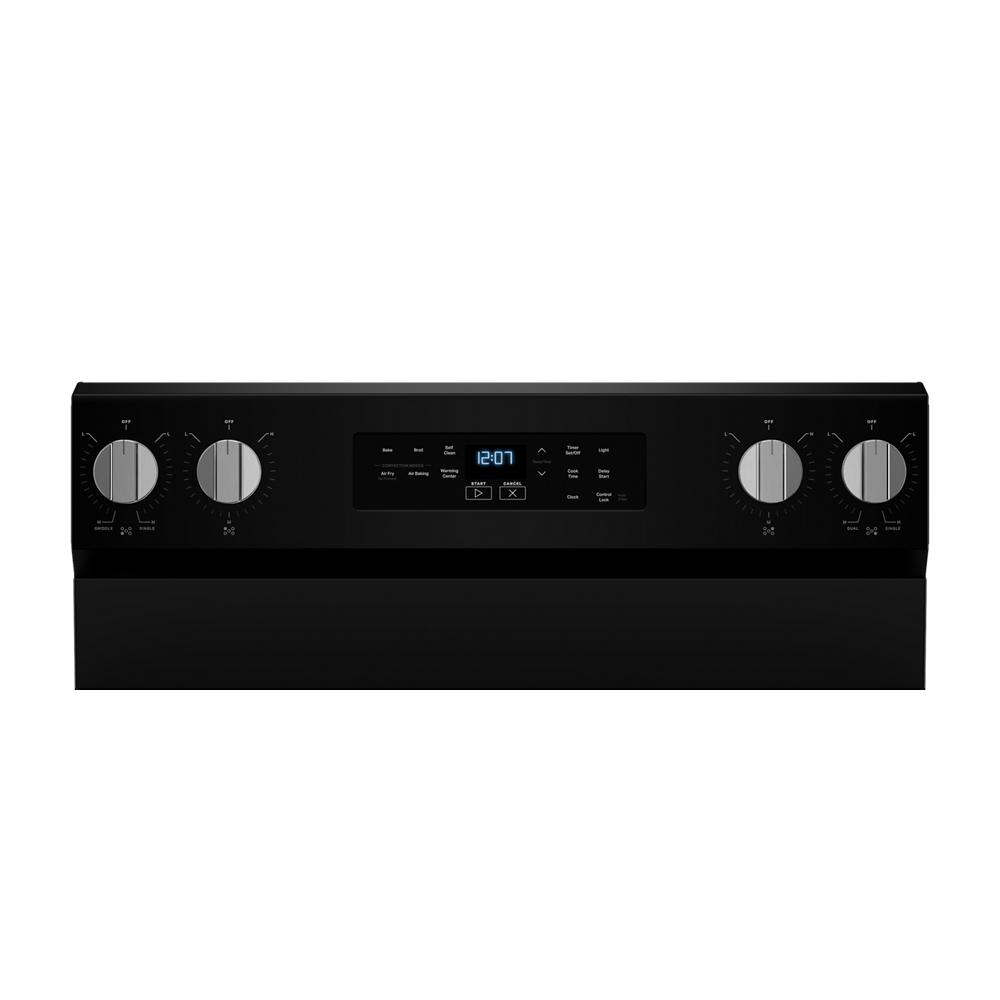 Black electric range control panel with digital clock, touch buttons, and four silver knobs for cooking settings.