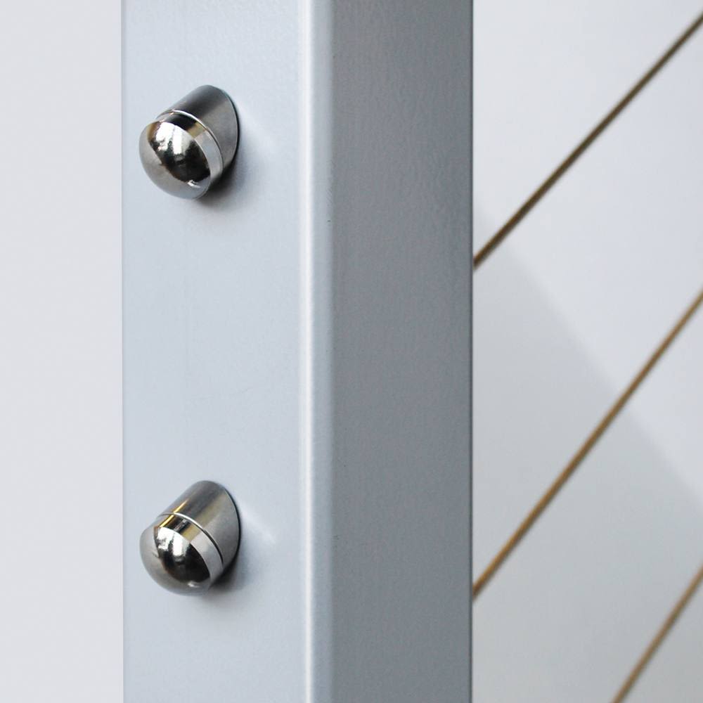 Close-up of two stainless steel beveled washers securing cables to a gray metal post for home improvement use