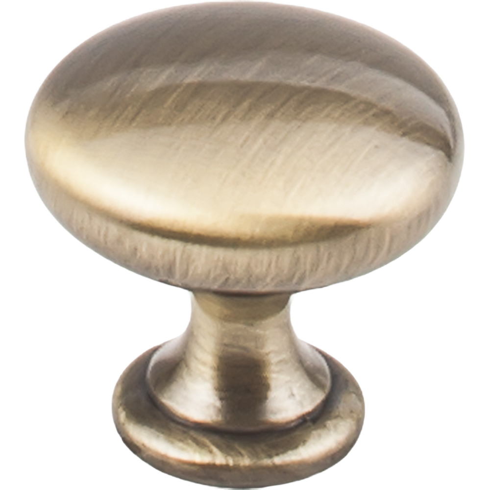 Brushed antique brass cabinet knob with rounded top, designed for home improvement projects and hardware updates