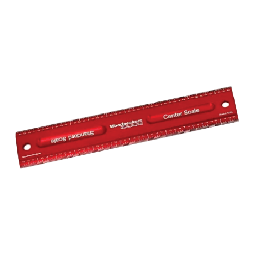 Red anodized aluminum woodworking ruler with beveled edges for precise measurements in hand and measuring tools use