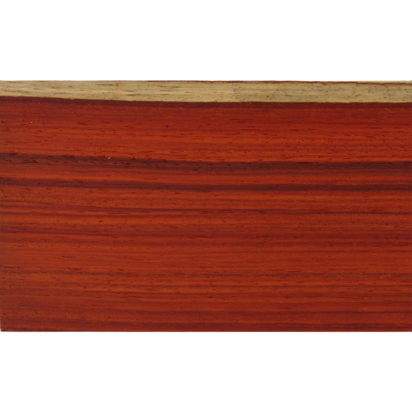 Close-up of smooth, reddish-brown African Padauk hardwood with natural grain patterns for woodworking and home improvement projects