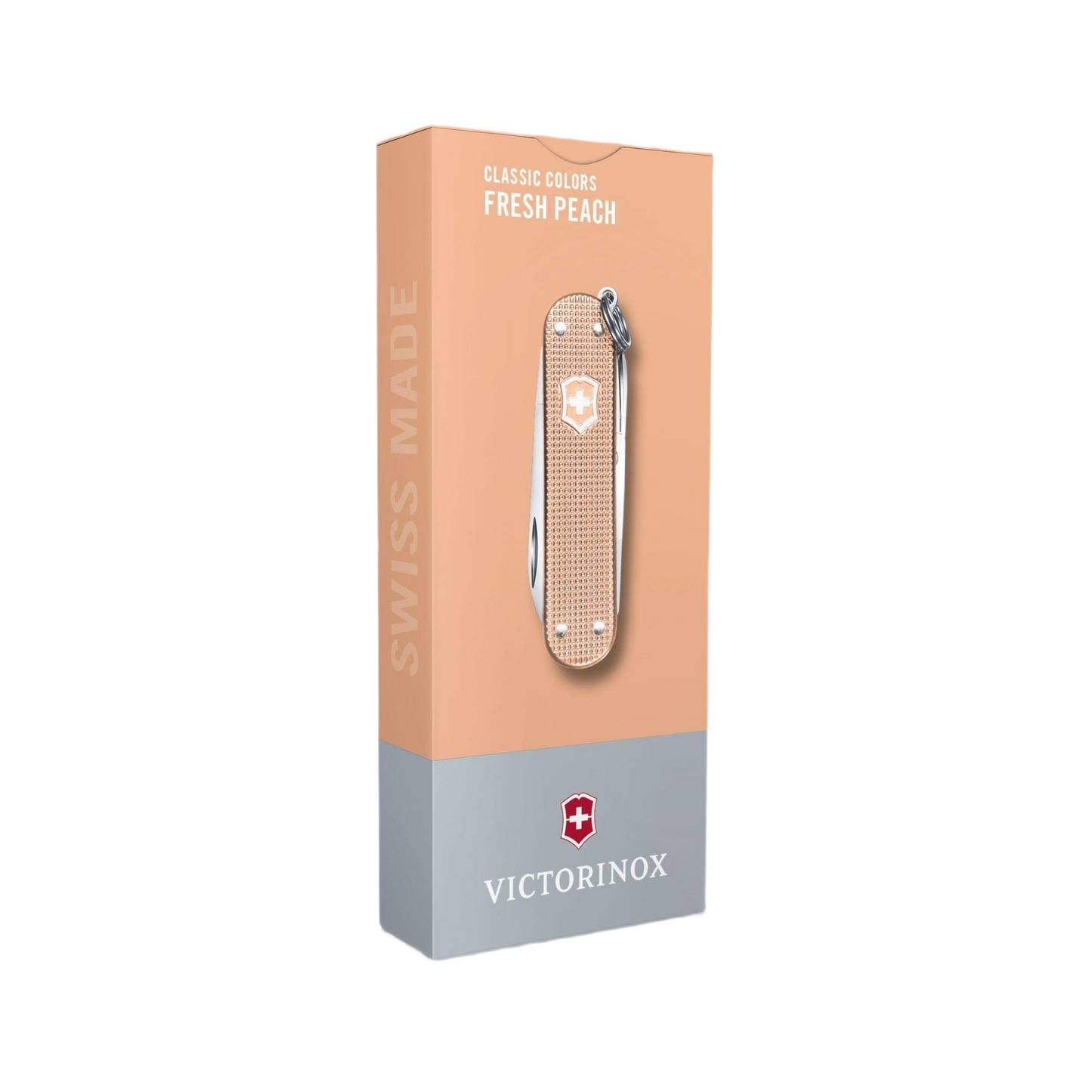 Victorinox pocket knife with fresh peach textured alox handle in retail packaging for tools and home improvement use