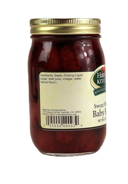 Glass jar of sweet pickled baby beets in brine with gold lid from Hartville Kitchen preserved goods collection