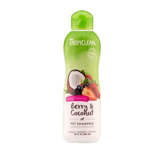 Green and white bottle of TropiClean deep cleaning pet shampoo with berry and coconut scent, 20-ounce size