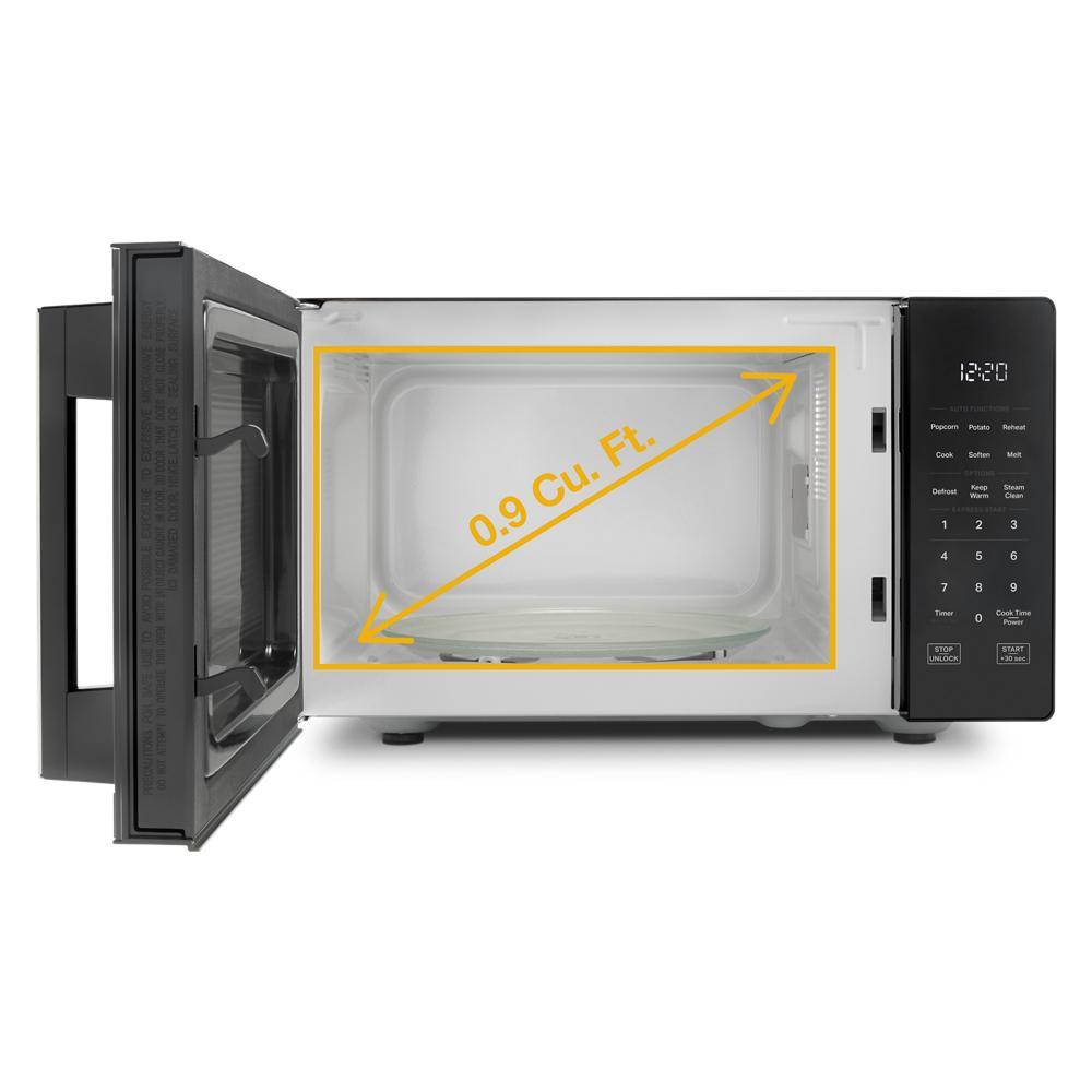 Open countertop microwave with 0.9 cubic feet capacity and digital control panel in kitchen appliances collection