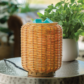 Rattan-style wicker lantern fragrance warmer with teal ceramic top for home ambiance and scent diffusion