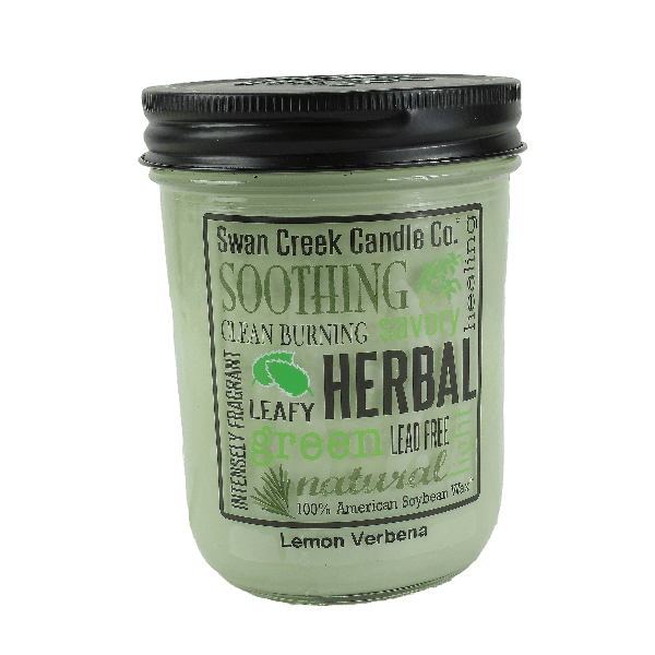 Glass jar candle with black lid and green herbal-themed label for calming lemon verbena scent ambiance