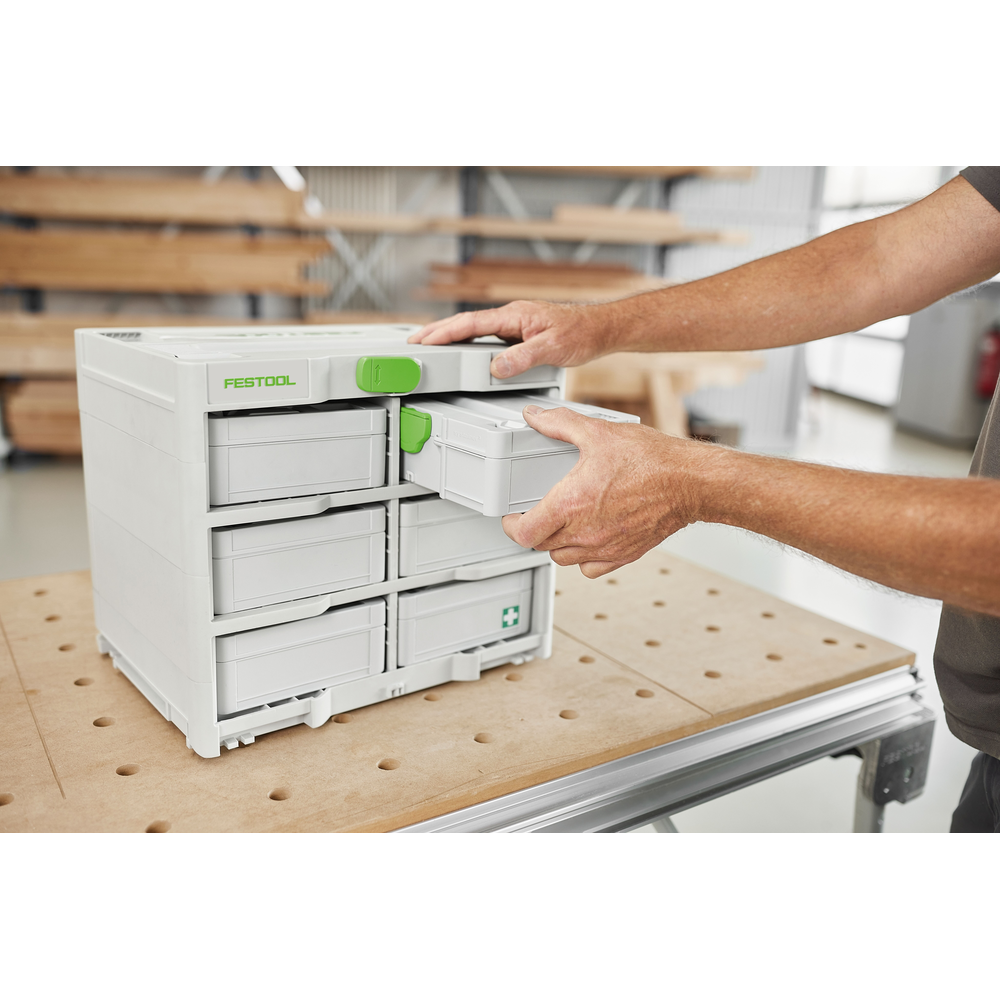 Compact gray and green modular storage unit with drawers for organizing tools and home improvement supplies