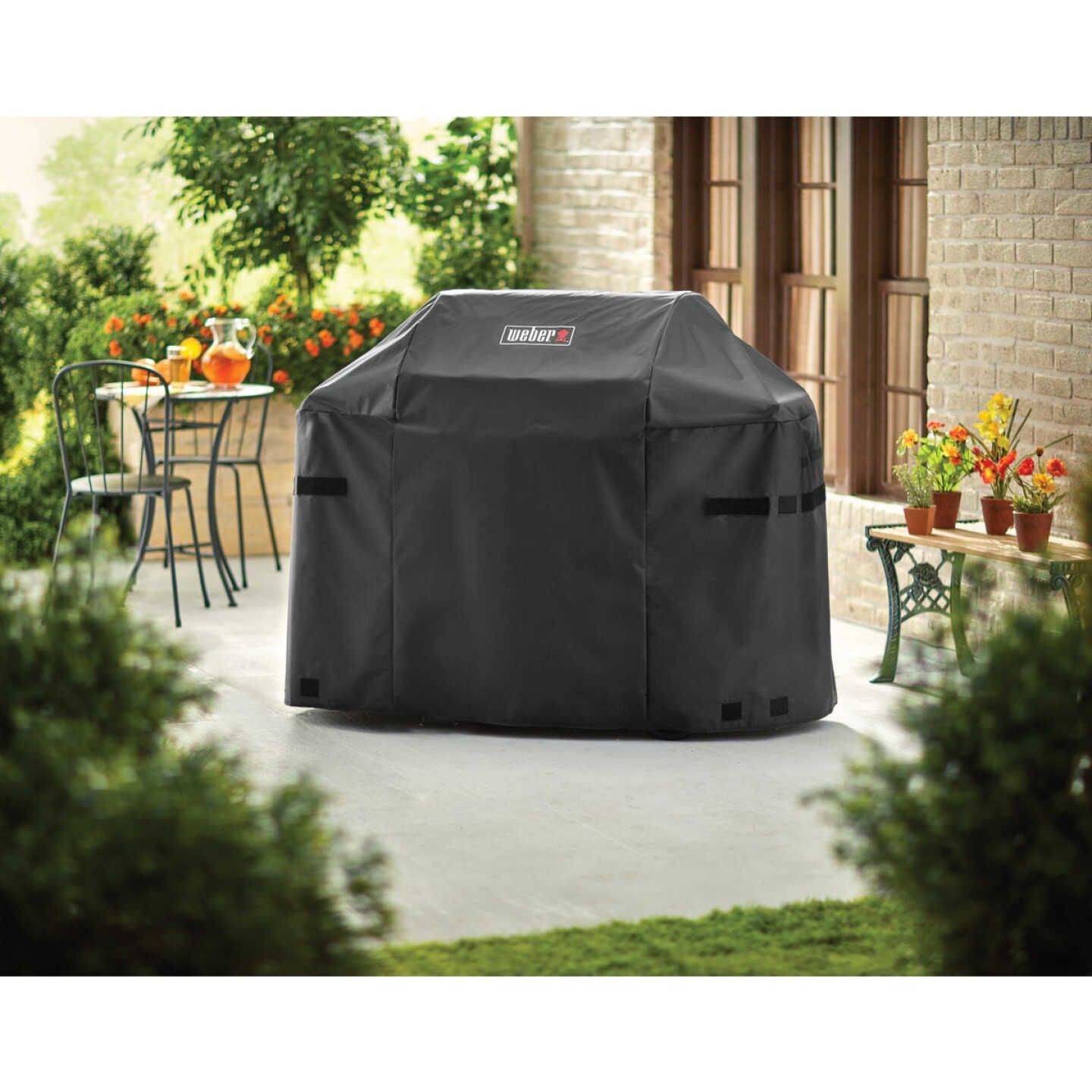 Black polyester protective cover designed for a 42-inch gas grill with weather-resistant and durable features for home improvement.