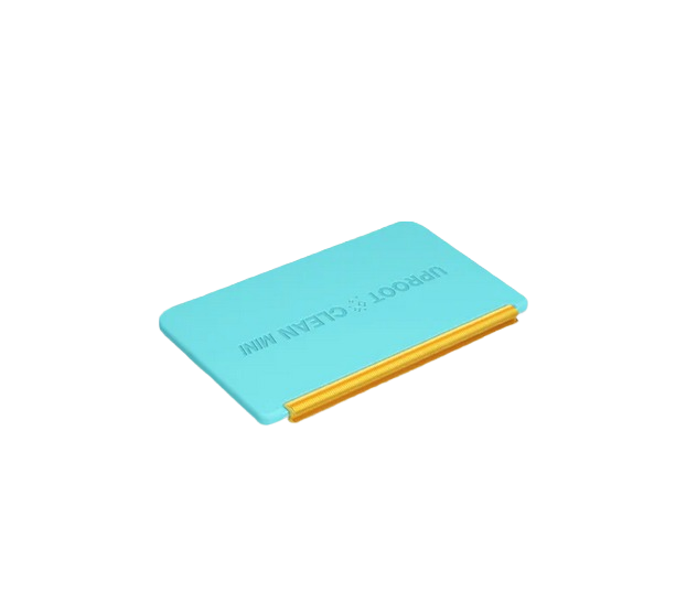 Compact blue cleaning tool with gold scraping edge designed for efficient home improvement cleaning tasks