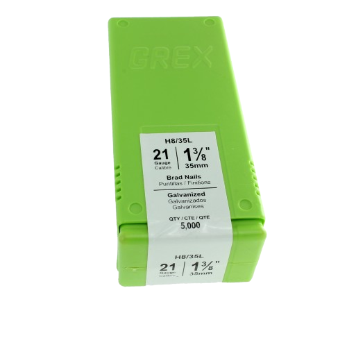 Green plastic box of galvanized 21-gauge brad nails measuring 1 3/8 inches for home improvement projects