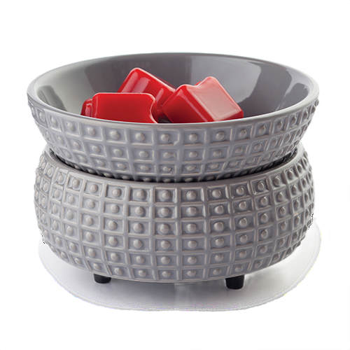 Gray ceramic candle warmer with textured surface holding red wax melts for home ambiance and fragrance