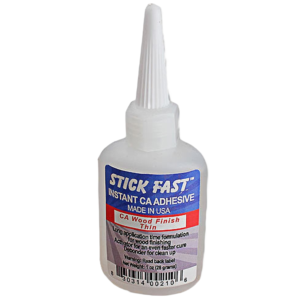 Plastic bottle of thin instant CA wood finish adhesive with pointed nozzle for precise application in home improvement tasks