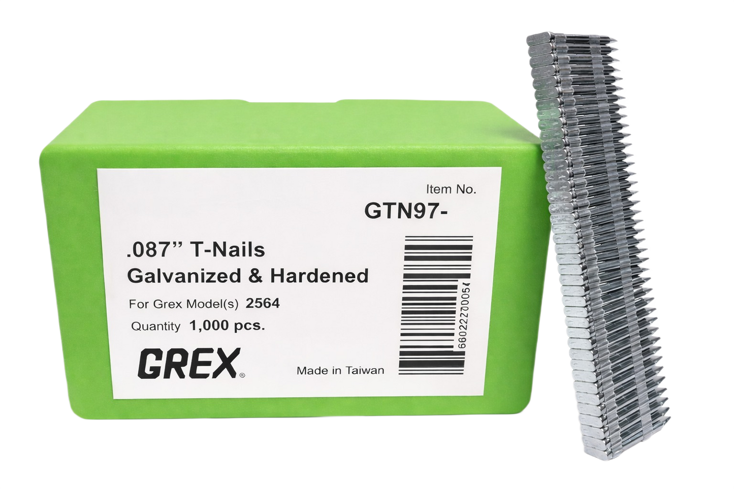 Stack of galvanized and hardened T-nails next to green box for fasteners in hardware and home improvement use