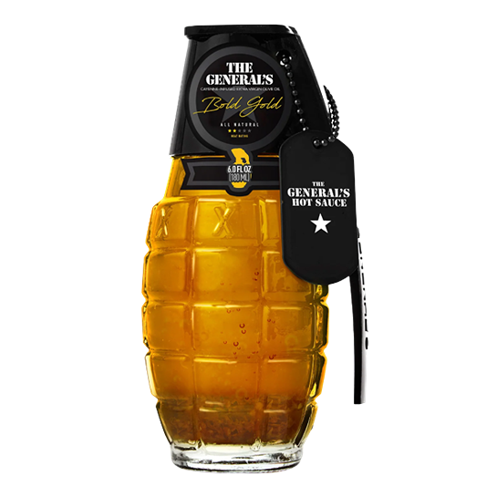 Glass bottle shaped like a grenade containing golden cayenne infused olive oil with black tag for kitchen use
