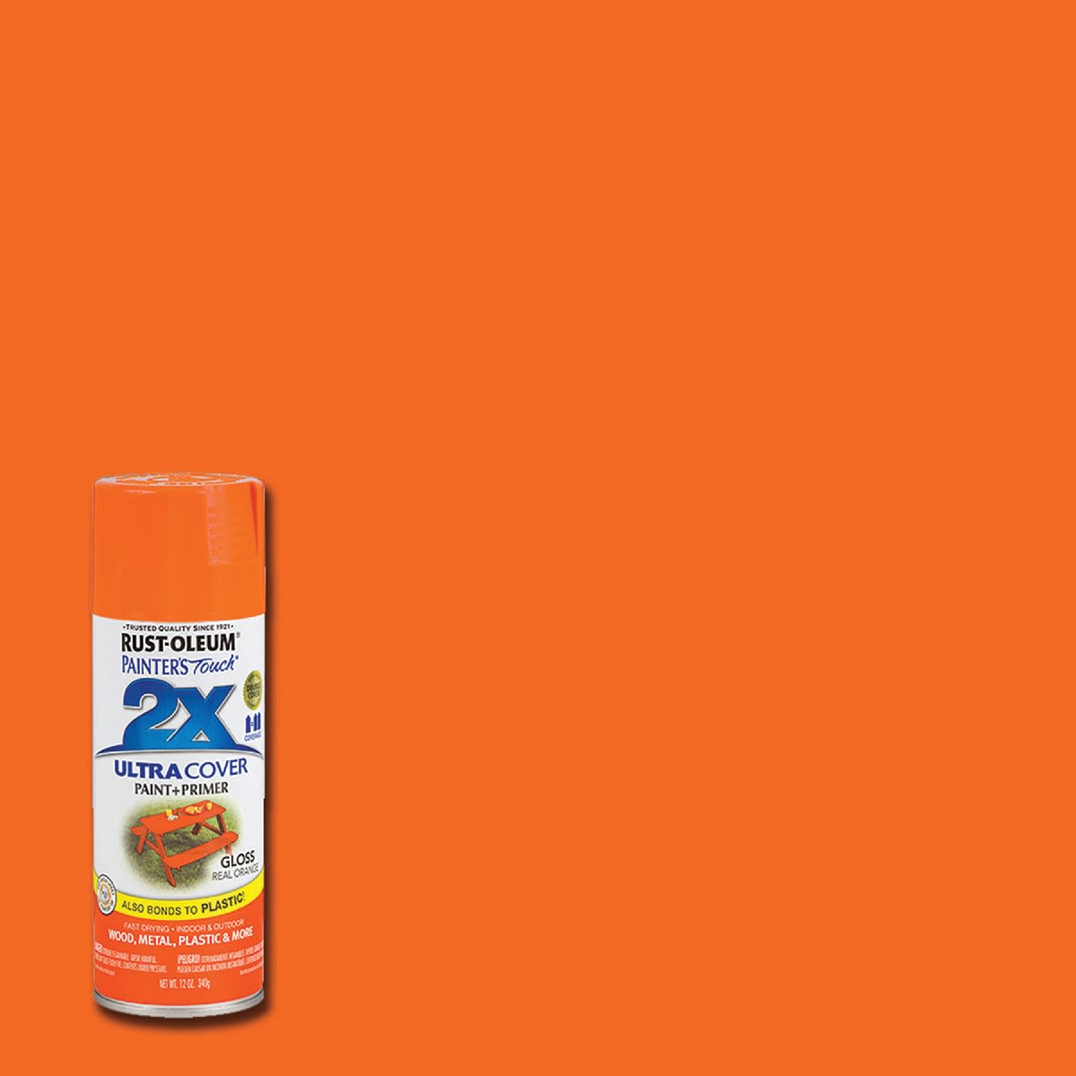 Glossy bright orange spray paint can against a matching solid color background for home improvement projects