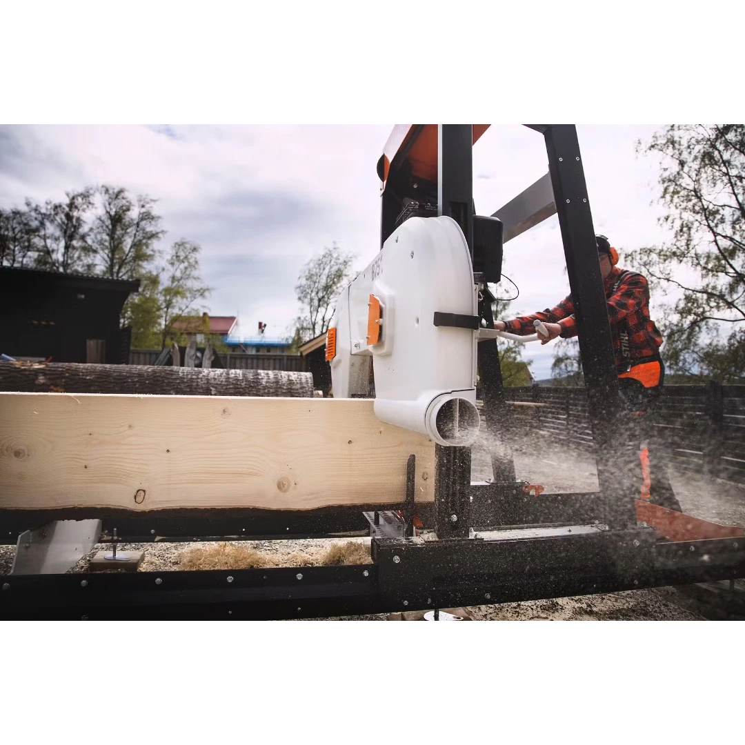 Band sawmill with gas engine cutting large lumber outdoors for tools and home improvement projects