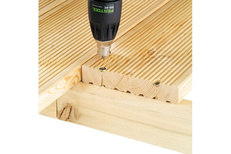 Festool FastFix drill chuck attached to power drill driving screws into grooved wooden planks for home improvement.