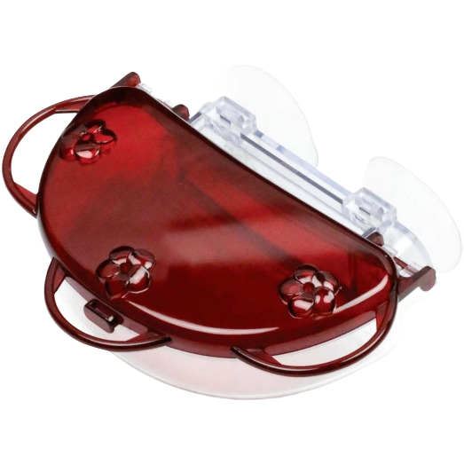 Red plastic hummingbird feeder with flower-shaped feeding ports and clear suction cups for window attachment
