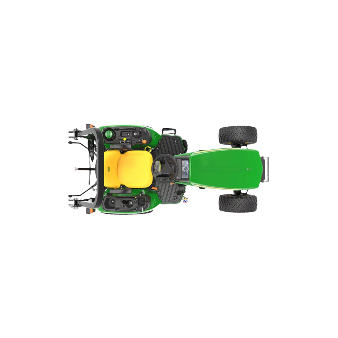 Top view of green and yellow compact tractor with rugged tires and operator seat for tools and home improvement tasks