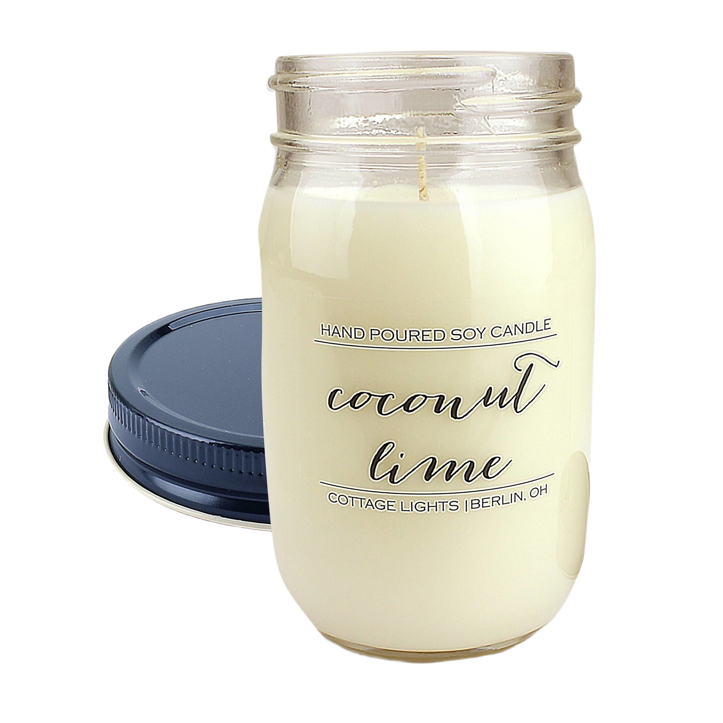 Glass jar soy candle with coconut lime scent and navy lid for home accents and decor collections