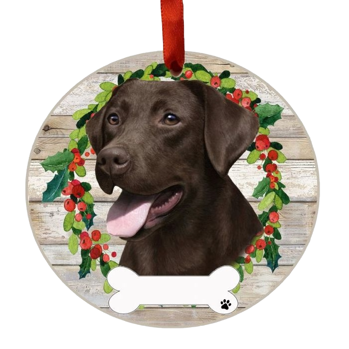 Round Christmas ornament featuring a Chocolate Labrador portrait framed by a festive wreath with red berries and green leaves