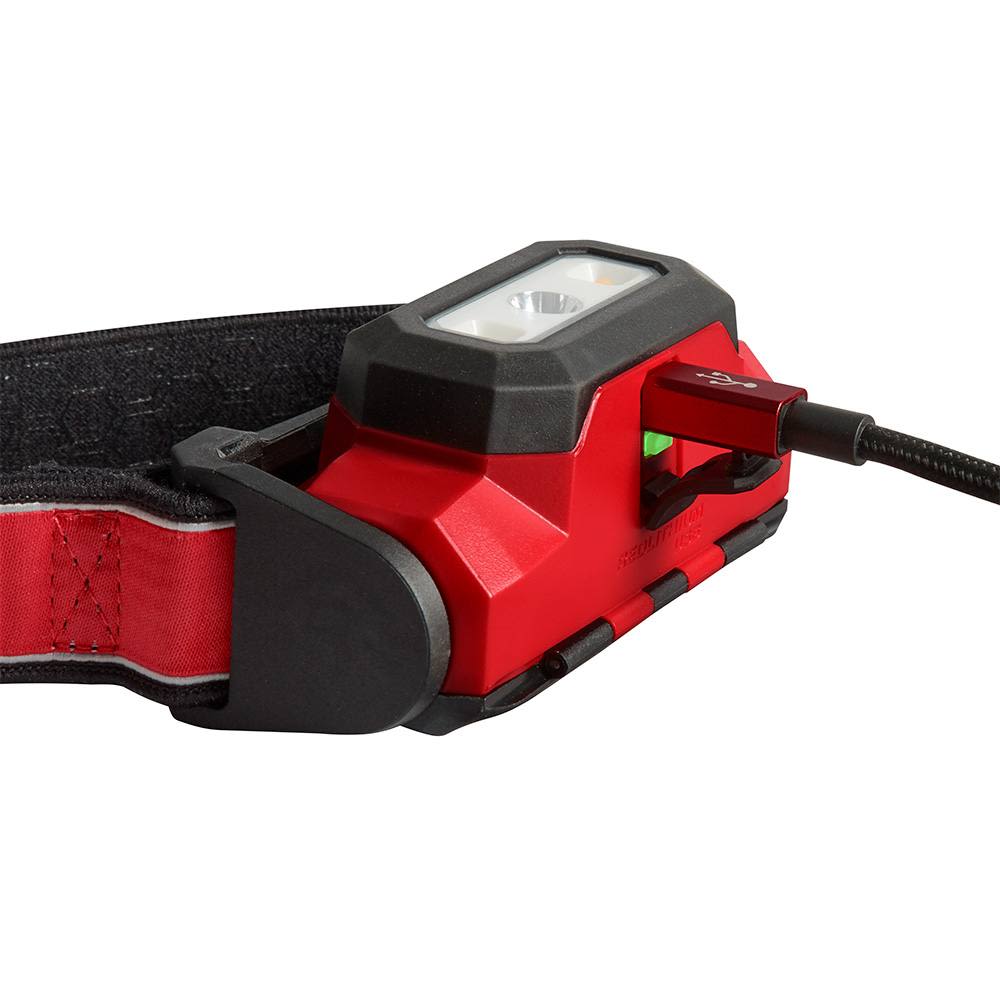 Red and black rechargeable LED headlamp with USB charging port and adjustable strap for hands-free tools and home improvement use