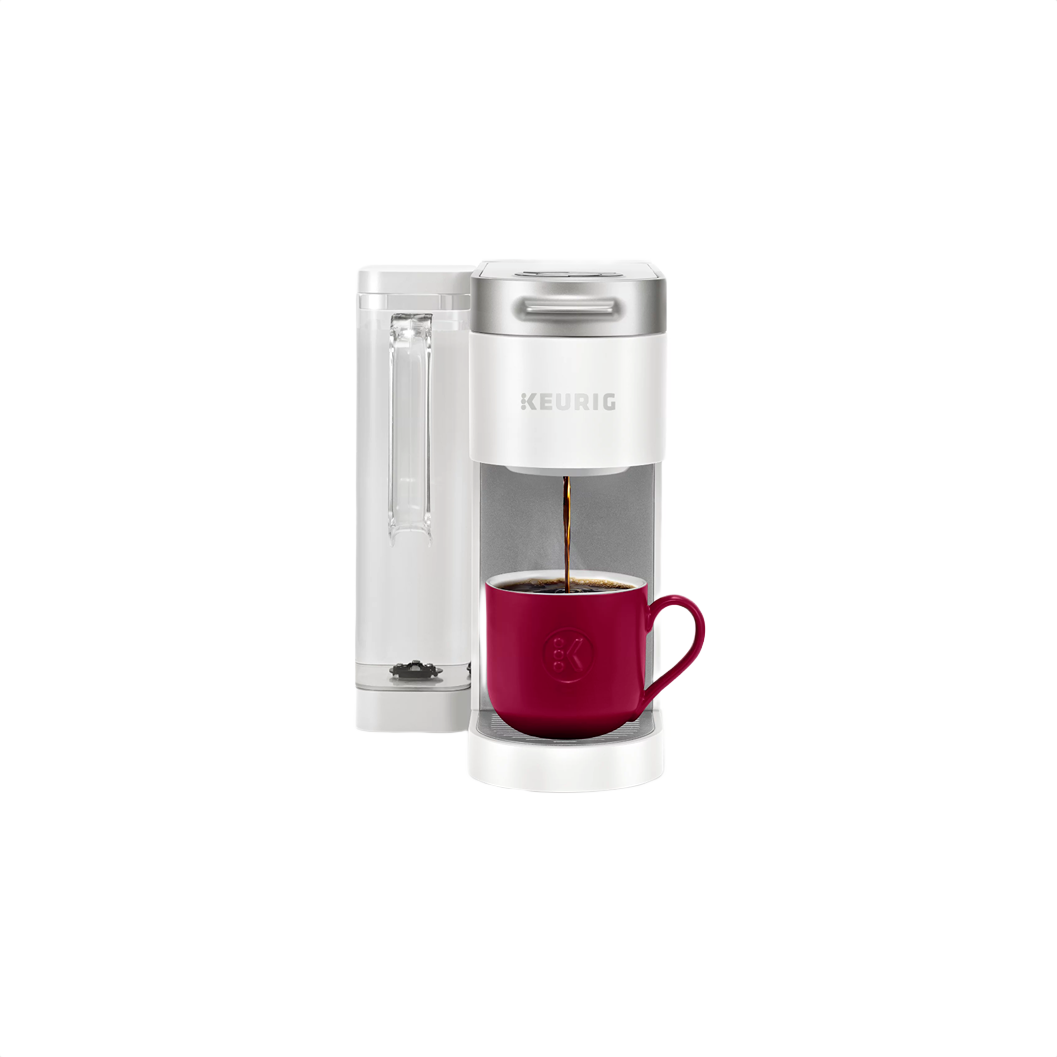 White single-serve coffee maker brewing into a red ceramic cup, ideal for convenient home beverage preparation