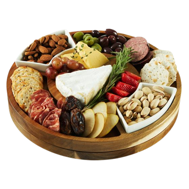 Round wooden Twine rotating board with assorted cheeses, crackers, nuts, fruits, and cured meats for serving appetizers
