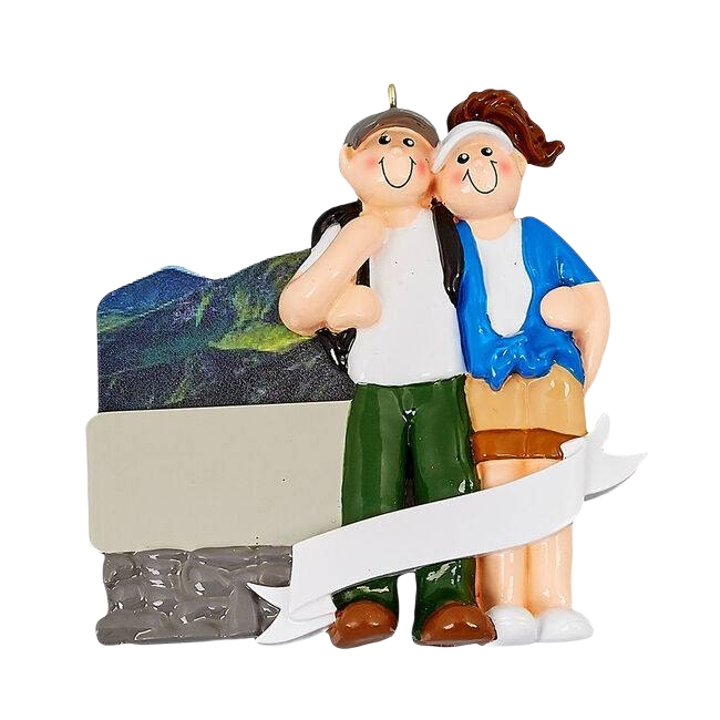 Couple figurine embracing with mountain background and blank banner for Christmas Ornaments & Tree Decorations collection
