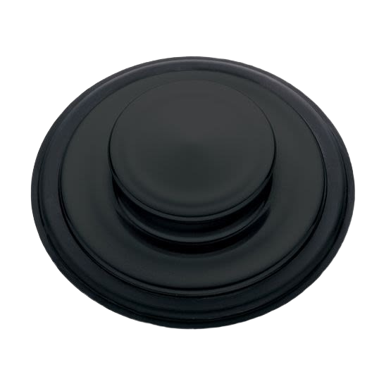 Black circular sink stopper with raised center for sealing drains in home improvement and plumbing tasks