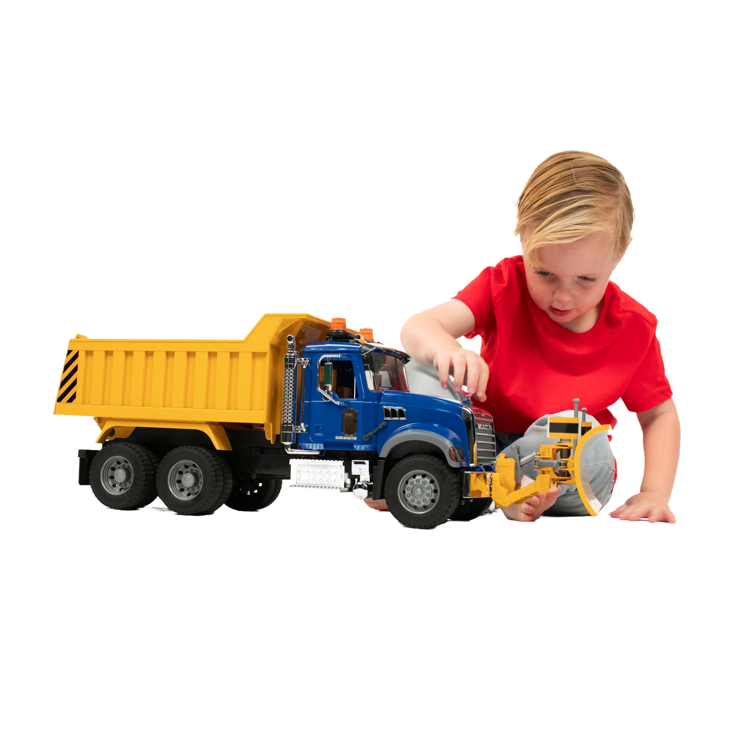 Young child in red shirt playing with detailed blue and yellow Bruder Toys 1:16 scale dump truck in Vehicles & Remote Controlled Toys collection