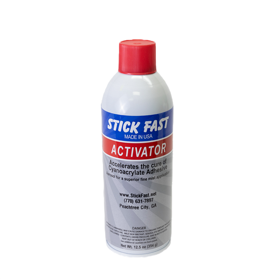 White aerosol can with red cap containing Stick Fast activator for cyanoacrylate adhesive curing in home improvement tasks