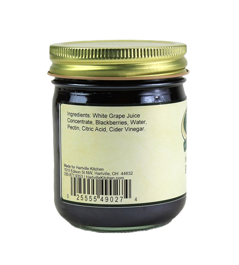 Glass jar displaying ingredient list for Hartville Kitchen blackberry spread in jams and jellies collection under $25