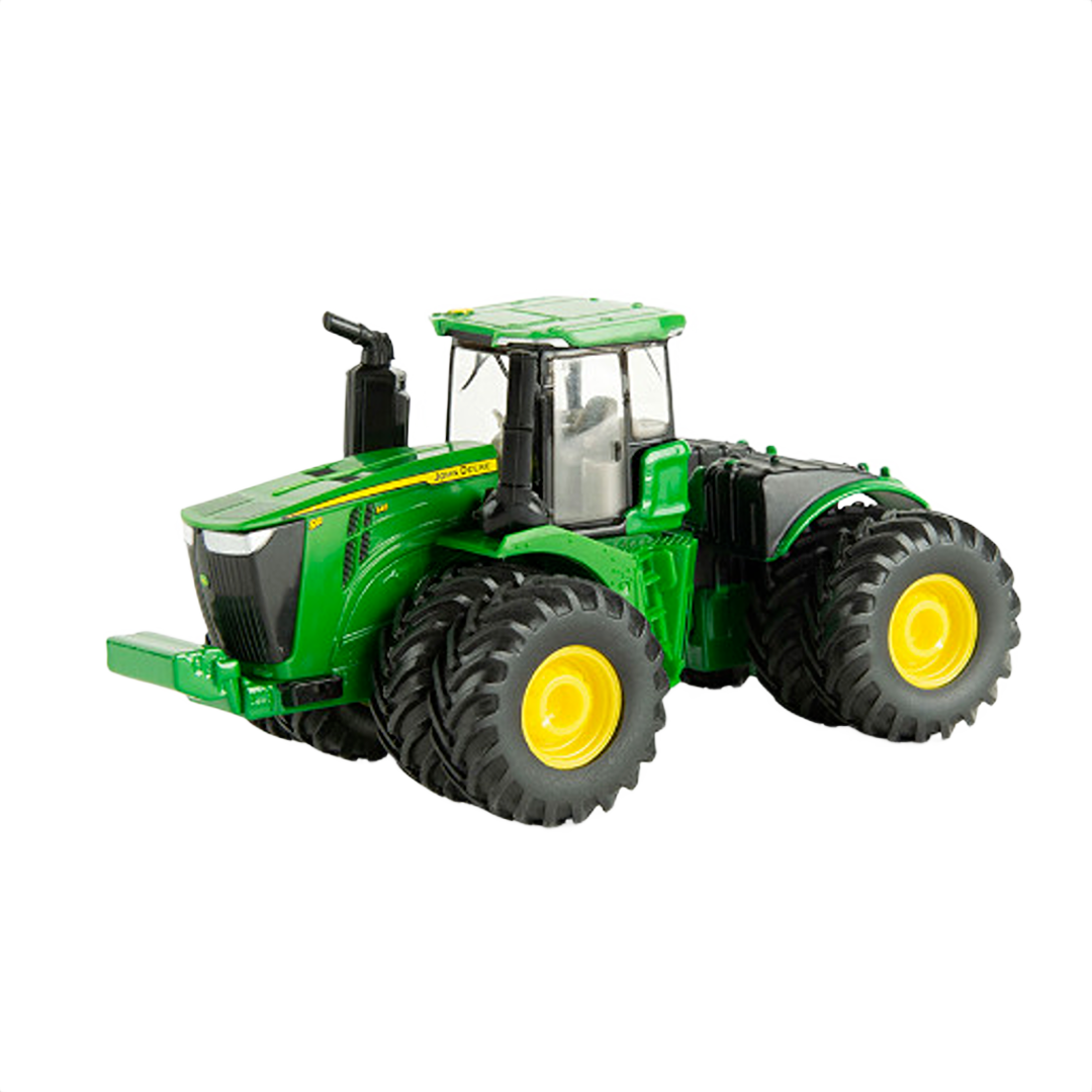 Green and yellow toy tractor with large dual rear wheels and detailed cabin for children’s play collection