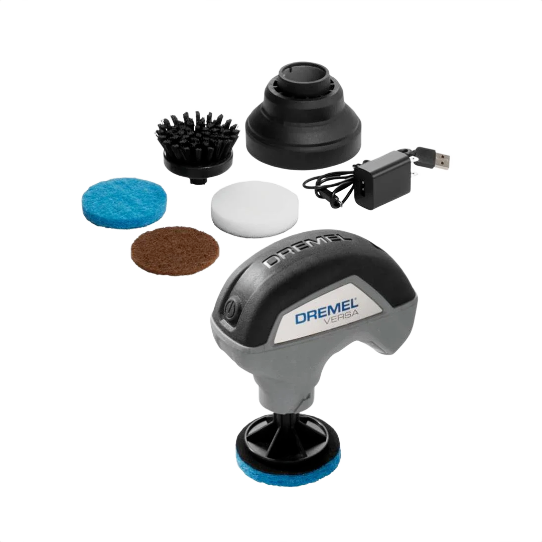Compact power cleaning tool kit with multiple brush and pad attachments and USB charger for home improvement use